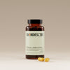 Frondescent berberine+ supplement bottle with capsules on a beige background