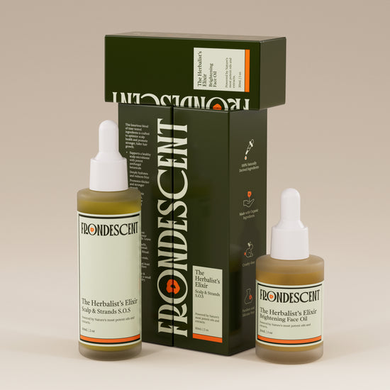 Frondescent's hair and face oils on a beige background